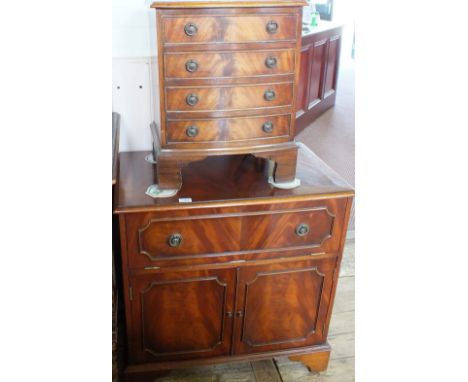 A reproduction Mahogany bow fronted four drawer chest and a TV cabinet