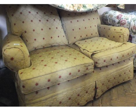 A MultiYork mustard and terracotta two seater sofa