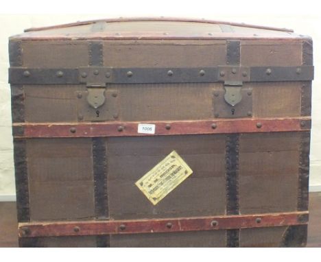 A Victorian metal bound dome top trunk