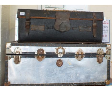 A metal cabin trunk and one other 
