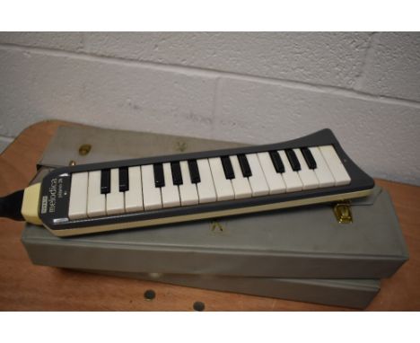 Three vintage Hohner Melodica (26/27) in vinyl cases