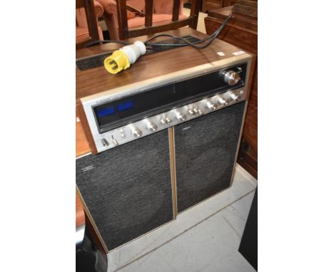 A vintage Pioneer stereo receiver, model SX-737 and a pair of Goodmans speakers