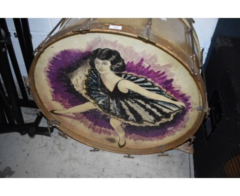 A vintage kick drum having painted dancing girl decoration