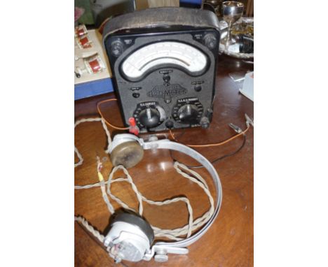 A Universal Avometer Model 8, and a pair of vintage headphones by Sterling of London