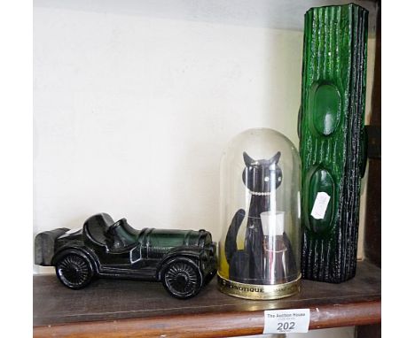 Green Sklo Union glass vase, vintage Max Factor 'Hypnotique' perfume bottle with cat and an Avon perfume glass veteran car bo