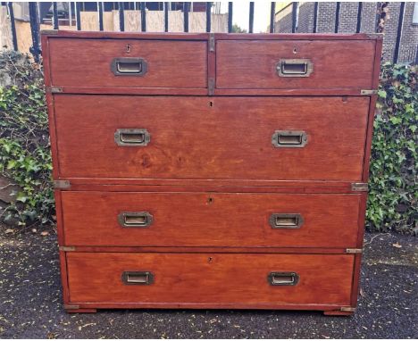 A 19th century brass mounted teak campaign chest stamped Army and Naval CSL makers, in two parts, with two short drawers abov