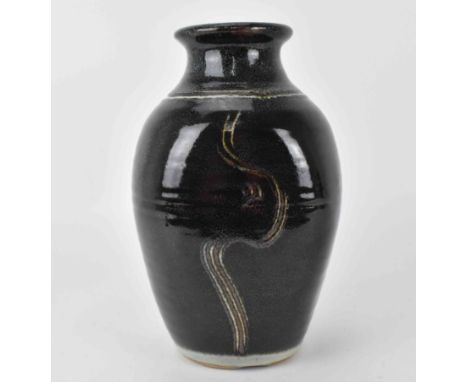 Eddie Hopkins (1941-2007) for Winchcombe Pottery, a stoneware ovoid shaped vase with dark mottled glaze, the front decorated 
