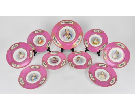 A large Sevres style hand painted dish with pink ground and central portrait of Louis XV, together with a set of six plates a