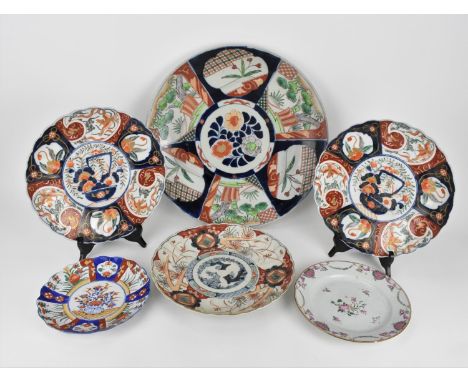 A collection of 19th century and early 20th century Japanese Imari dishes, to include a large 20th century Imari charger with