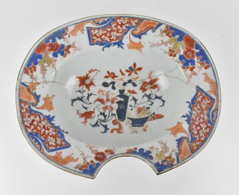 A Chinese Qing dynasty, probably Qianlong period, bleeding / barber's bowl, of oval form with central vase and floral composi