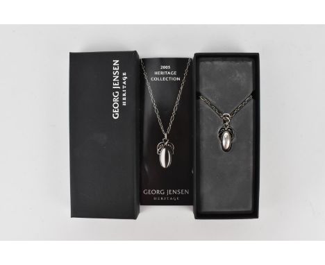 A Georg Jensen sterling silver 2005 Heritage Collection pendant on a trace link chain, with original fitted box and presentat