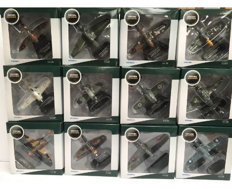 12 x Oxford Aviation Front Line Fighters 1/72 scale models, includes AC009 Kittihawk MkIa. M and boxed. 