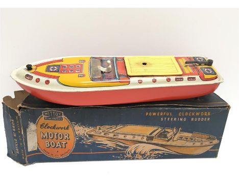 Mettoy Motor Boat No.6605: clockwork tinplate model with red hull, detailed tinprinted deck and plastic windscreen/driver/eng