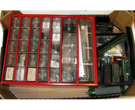 A 30 drawer Organiser containing a quantity of 00 spares including couplings, wheels, motors, Kings Names packets, transfers 