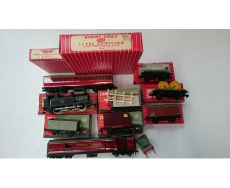 A box containing a HORNBY DUBLO 2R Locomotive,  2R Hornby Dublo and Trix Goods Wagons and other items - 2206 BR Black 0-6-0T 