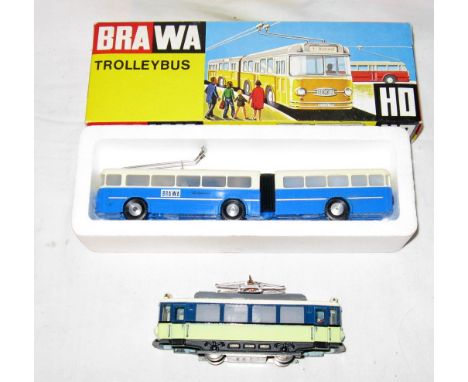 A BRAWA 6104  Trolley Bus (Near Mint Boxed) and a vintage MAMO/MARKLIN O/H electric Tram Car with working Lights (Excellent).