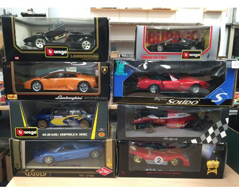 Seven 1/18 and one 1/24 scale diecast sports cars by Bburago, Solido and others, includes Paul's Model Art Grand Prix Ferrari