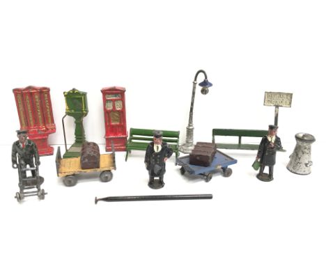 Selection of John Hill & Co. and other lead/ tinplate railway station accessories and figures, includes Station Master, ticke