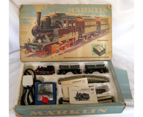 MARKLIN 3R Train Set comprising a 3029 0-6-0T with Instructions (service required), 2 x 4 wheel Coaches (Good), an oval of Tr