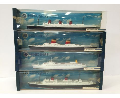 Four Hornby Minic Ships, 1/1200 scale: M702 RMS Queen Elizabeth; M715 RMS Canberra; M704 SS United States; M703 RMS Queen Mar