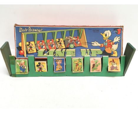 Chad Valley Walt Disney's Line Up Game comprising cardboard triangle targets featuring Disney characters, on wooden stand. F,