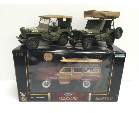 Two Danbury Mint World War II military models: Jeep Replica (some minor damage/small parts unattached); Rocket Launcher Jeep 