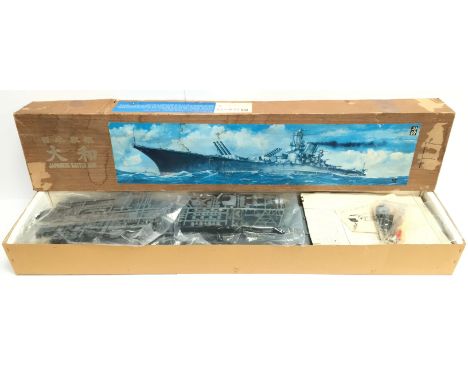 Yamato 1/250 scale Japanese Battle Ship plastic model kit. Unbuilt and appears complete with parts on sprues, motor and instr