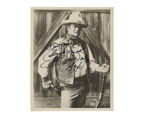 JOHN WAYNE - John Wayne Autographed Photo - A photograph autographed by John Wayne. Famed for his roles in Westerns, Wayne wa