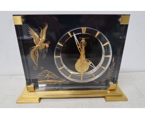 A 1960's Jaeger Le Coultre mantle clock- 22cm x 16cm - in working order and good condition 