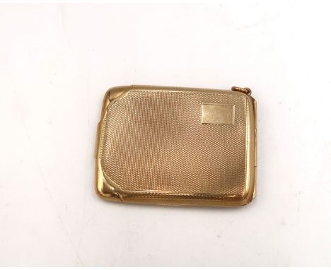 A 9ct hallmarked gold vic memoire with engine turned finish 