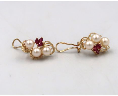 A pair of cultured pearl, ruby and diamond cluster earrings. Stamped 14K. Weight 6.73grams