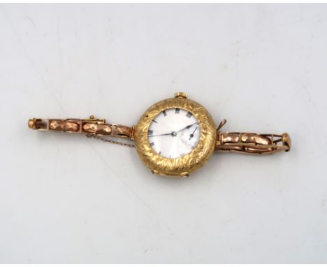 An 18ct hallmarked yellow gold ladies half hunter watch with Roman numerals to white enamel dial with subsidiary seconds at 6