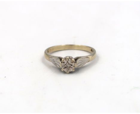 A 9ct yellow gold hallmarked solitaire ring with small illusion set diamond in white gold - ring size L/M - approx weight 2.3