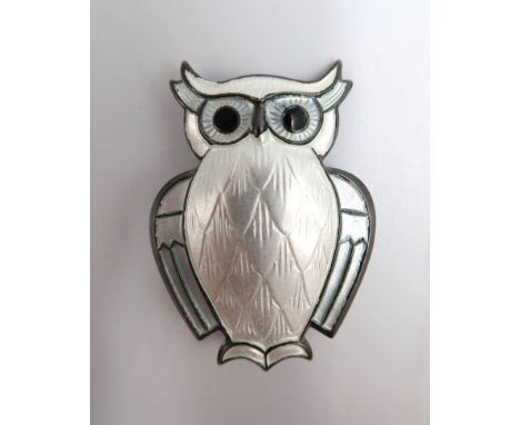 A silver and white enamel David Andersen Norwegian owl brooch - in good condition 