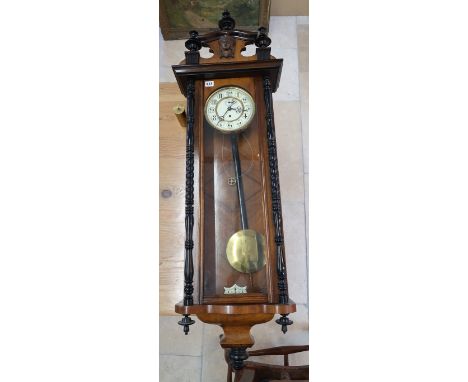 A walnut cased single weight Vienna wall clock, Arabic numerals to white enamel dial, subsidiary seconds at 12 o'clock - Heig