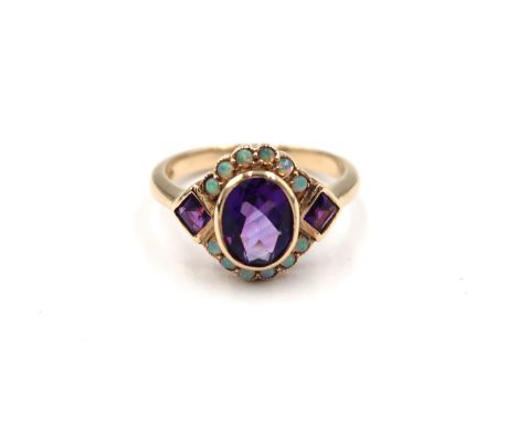 A 9ct yellow gold Art Deco style amethyst and opal ring - amethyst and opals are a good colour and well matched - head size a