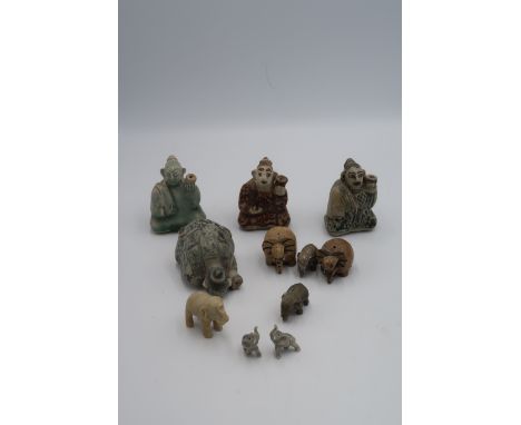 Four Oriental Water droppers, with seven small ceramic and metal animal figures tallest 5cm high, good condition