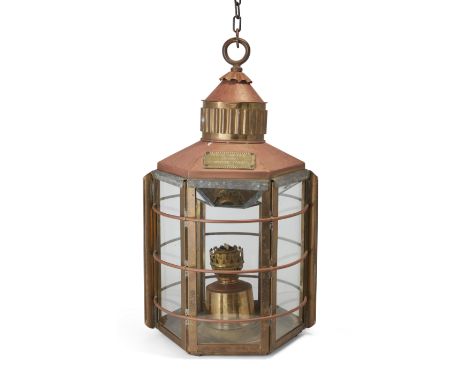 A Victorian hexagonal brass and copper oil burning ship's lantern, third quarter 19th century, the glass panels with lead and