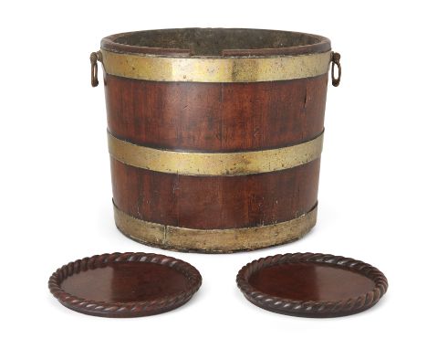 A George III mahogany and brass bound wine cooler or peat bucket, with twin handles, 29.5cm high, 30cm diameter; together wit