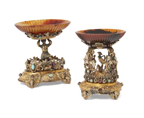 Two gilt-brass and agate tazze, probably Viennese, late 19th century, each mounted with garnets and turquoise opals, the larg