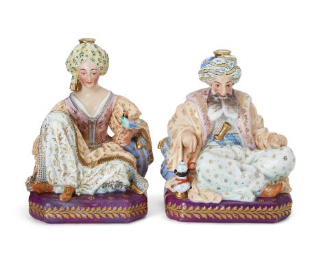 A pair of Paris (Jacob Petit) porcelain figural scent-bottles, mid-19th century, blue J.P. marks, modelled as a turbaned Sult