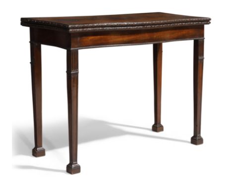 A George III mahogany "concertina" card table, last quarter 18th century, the hinged serpentine top with ribbon and rosette c