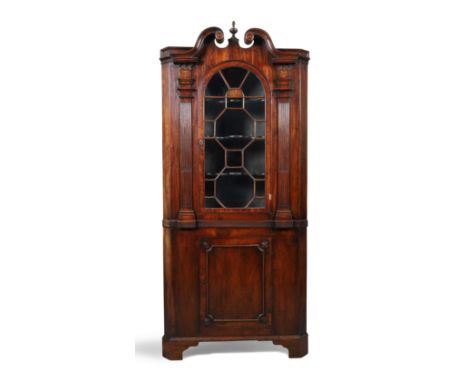 A George II inlaid walnut architectural floor standing corner cupboard, second quarter 18th century, 225cm high, 100cm wide, 