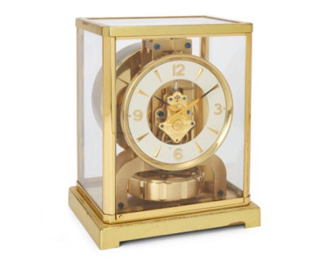 A Jaeger-LeCoultre Atmos clock, c.1950s, Caliber 526-5, serial no. 89560, the gilt-brass case with spirit level in base, the 