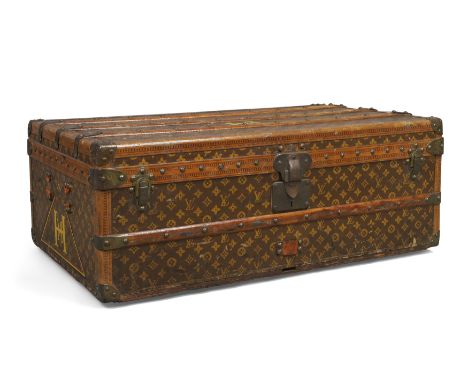 A Louis Vuitton cabin trunk, 1920s, covered in monogram canvas and painted with owner's monogram HM for Millie Harjes, lackin