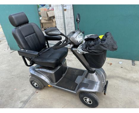 A STERLING S425 SHOP RIDER MOBILITY SCOOTER COMPLETE WITH CHARGER, KEY, MANUAL AND COVER BELIEVED IN FULL WORKING ORDER BUT N