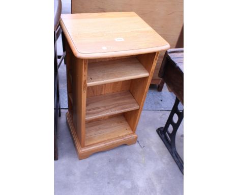 AN ERCOL ELM FOUR TIER OPEN DISPLAY STAND FOR BOOKS AND C.D.'S, 17" WIDE