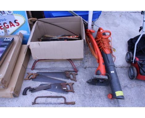 A FLYMO ELECTRIC GARDEN VAC AND A FLYMO ELECTRIC GRASS STRIMMER AND AN ASSORTMENT OF TOOLS TO INCLUDE SAWS, SAW BLADES AND A 