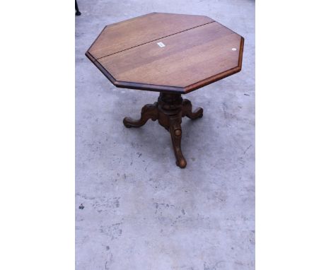 A VICTORIAN CUT-DOWN WORK TABLE ON TRIPOD BASE WITH LATER OCTAGONAL TOP, 28" ACROSS