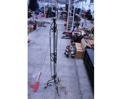A DECORATIVE WROUGHT IRON STANDARD LAMP BASE